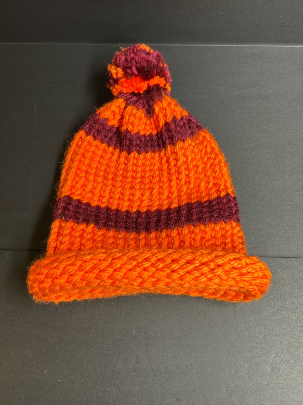 Pom-Pom Knit Beanie Hat in Bright Orange with Burgundy Stripes